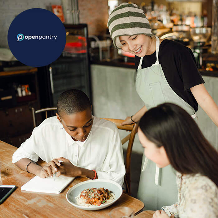 Restaurant staff assessing a new dish